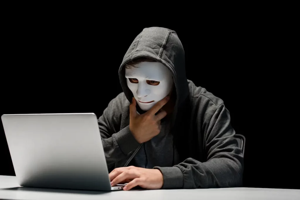 A person using a laptop incognito